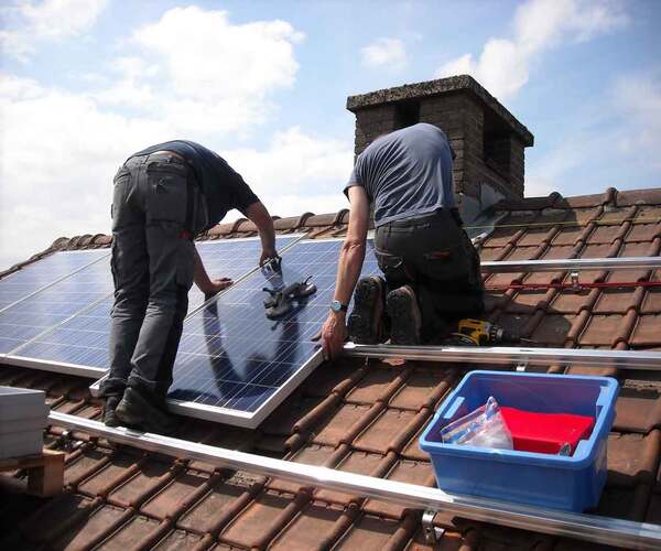 Solar panels powering a home battery system
